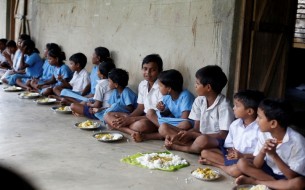 Children having Akshaya Patra Mid Day Meal in Puri