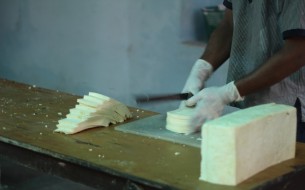 Chopping of paneer in Akshaya Patra Kitchen in Puri